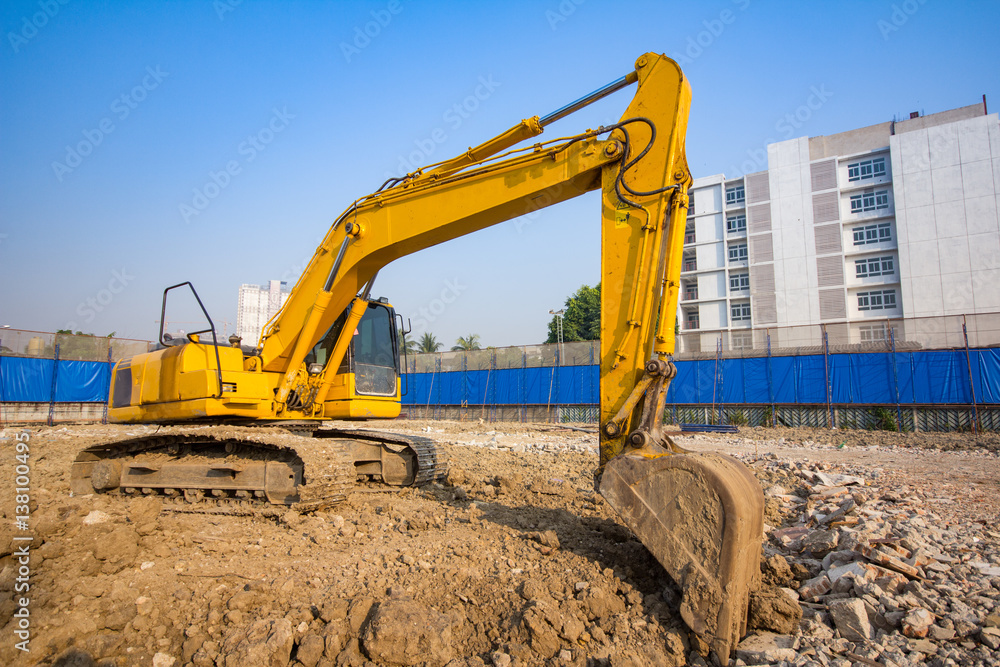 yellow backhoe loader on construction site and work yellow backhoe loader on construction site and work