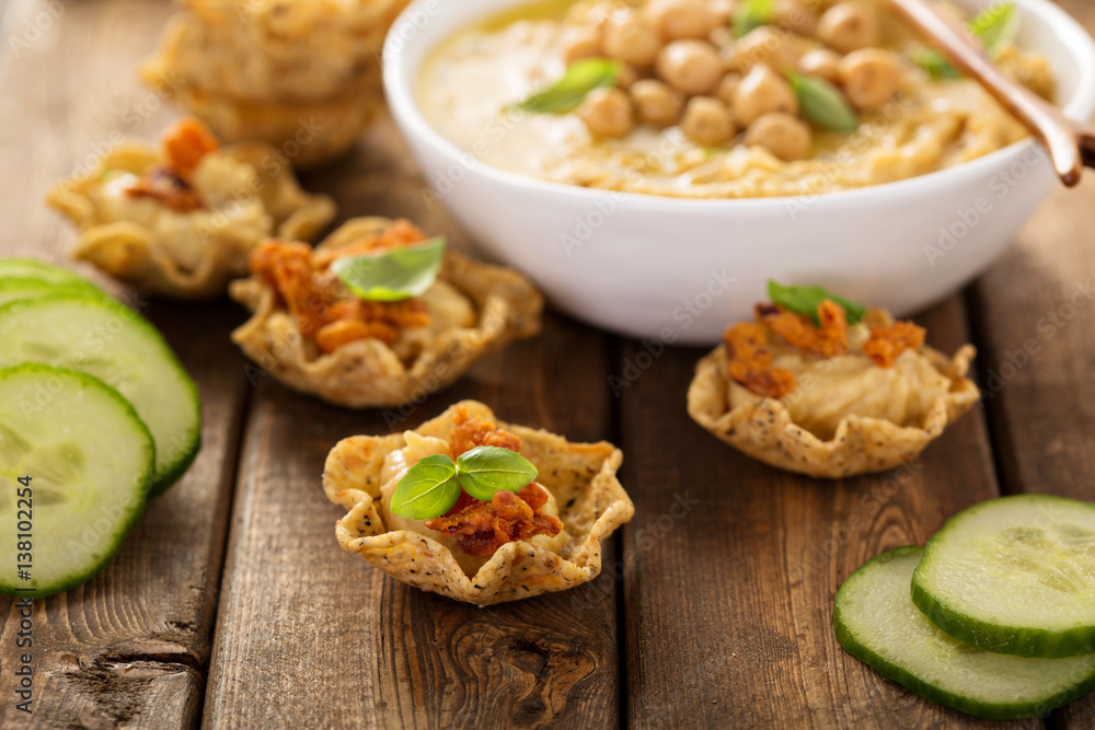 Homemade hummus in tortilla bowls