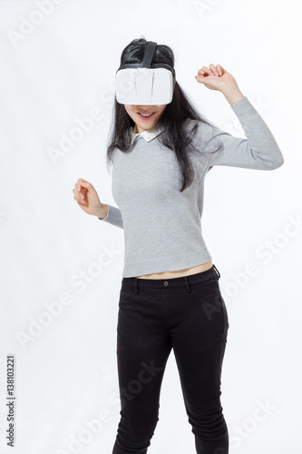 Teenage girl dances with 3D goggles