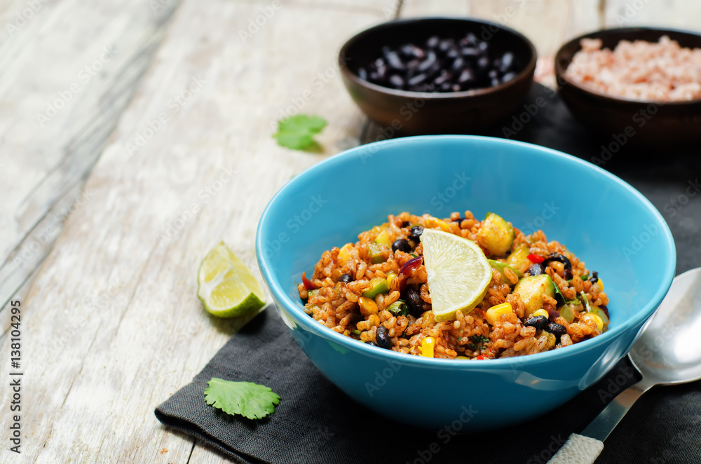 Fototapeta premium Black beans pepper cilantro zucchini lime brown rice