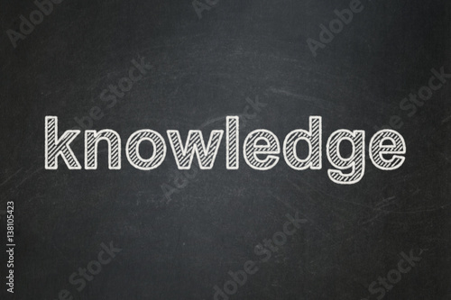 Education concept: Knowledge on chalkboard background