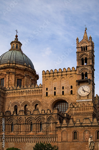 PALERMO, ITALY–03 January 2017: One of the main attractions of city - Palermo Cathedral. Amazing architecture of building. Clock tower and enormous dome of the cathedral. Palermo. Sicily