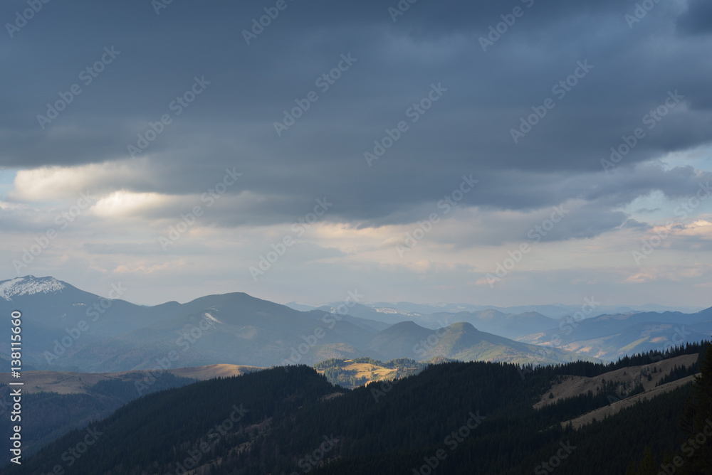 Mountain landscape with cloudy sky