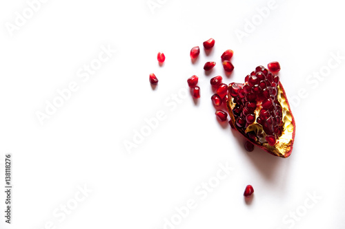 piece of pomegranate isolated on the white photo