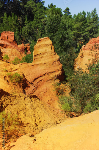 Orange ochre pigment picturesque hills. Roussillon, Provence, France.