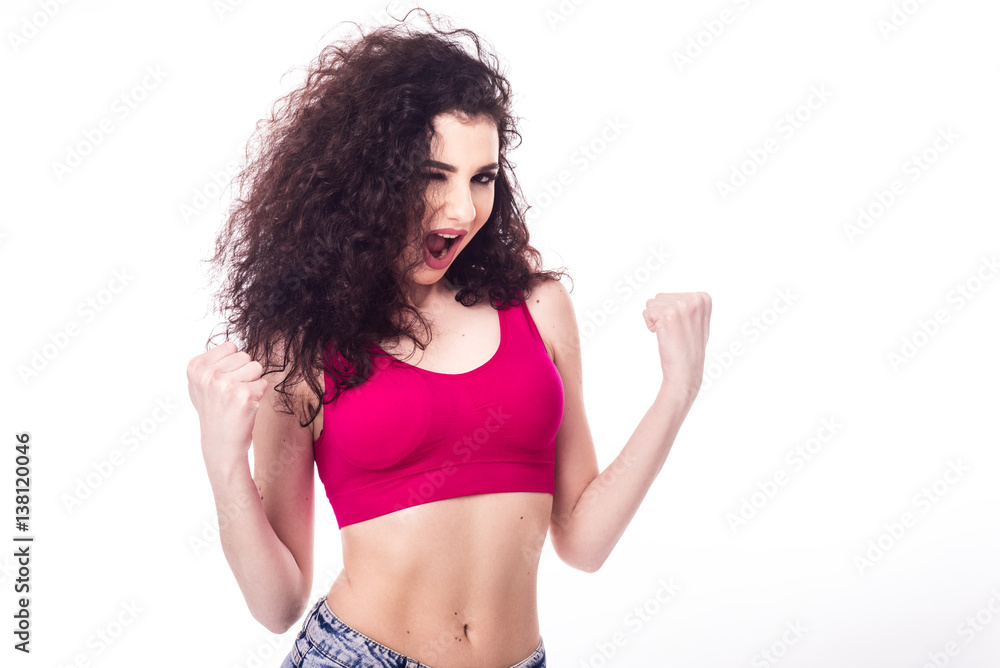 Portrait of a cheerful woman celebrating her success over white background Portrait of a cheerful woman celebrating her success over white background
