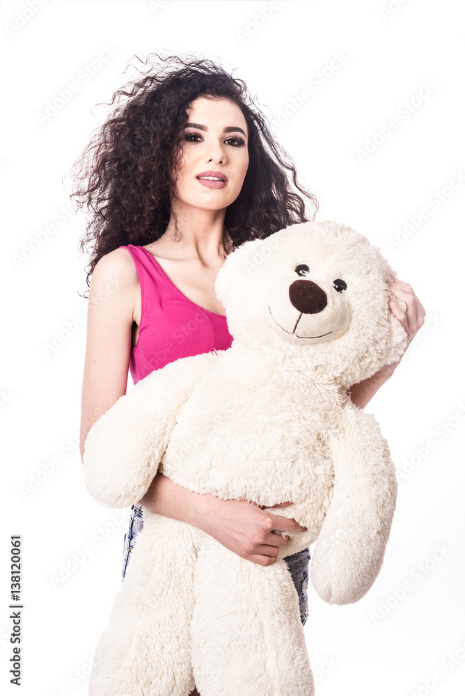 beautiful young woman with teddy bear posing in studio on white background beautiful young woman with teddy bear posing in studio on white background