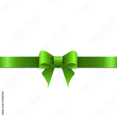 Green bow with ribbons on white background