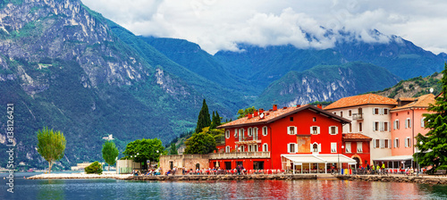 Alpine scenery - beautiful lake Lago di Garda and village Torbole. Italy