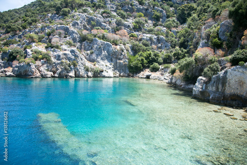 Sunken city of Kekova in bay of Uchagiz view from sea photo