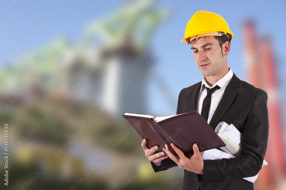 architect with the construction plans architect with the construction plans