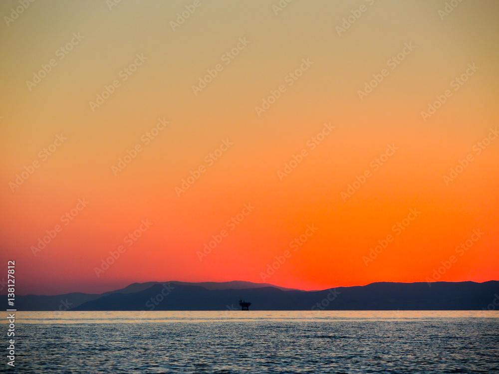 Fototapeta premium sunset over sea in skala kallirachis greece