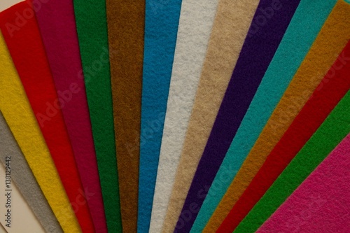 Colored felt background pattern.