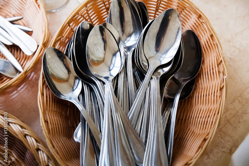 Obraz na plátně A lot of spoons in the basket