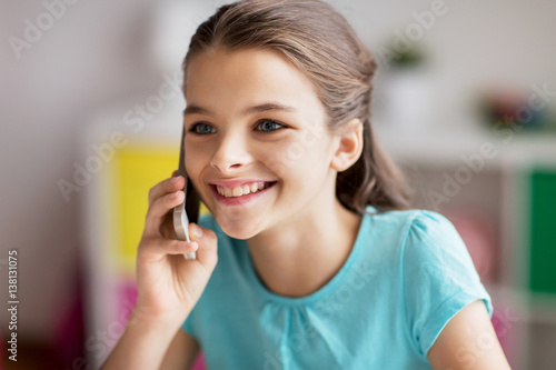 close up of girl calling on smartphone at home