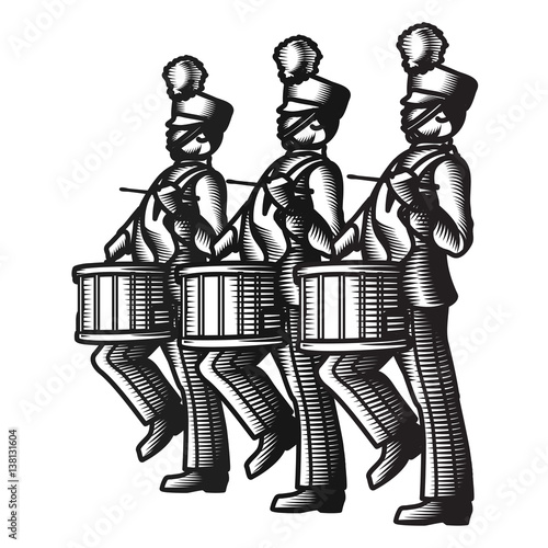 Marching soldier drummers marching in unison  wearing band uniforms.
