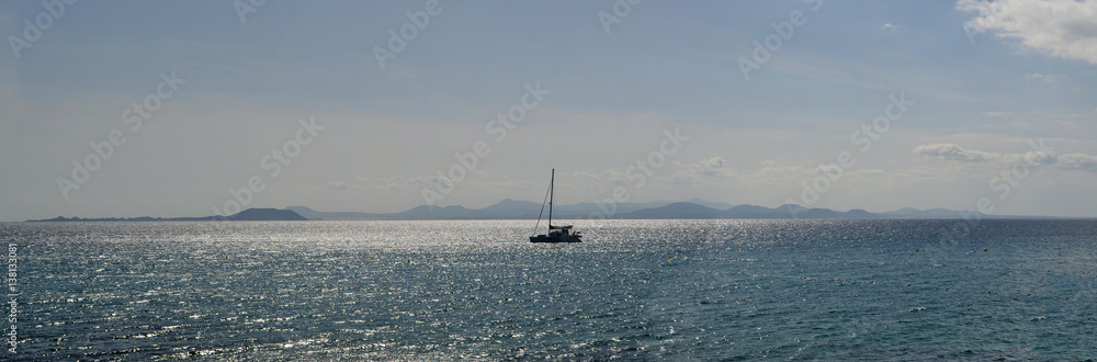 Ocean Panorama Yacht  with the Northern Coast of Fuerteventura and the Island of Lobos in the Background.