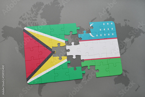 puzzle with the national flag of guyana and uzbekistan on a world map