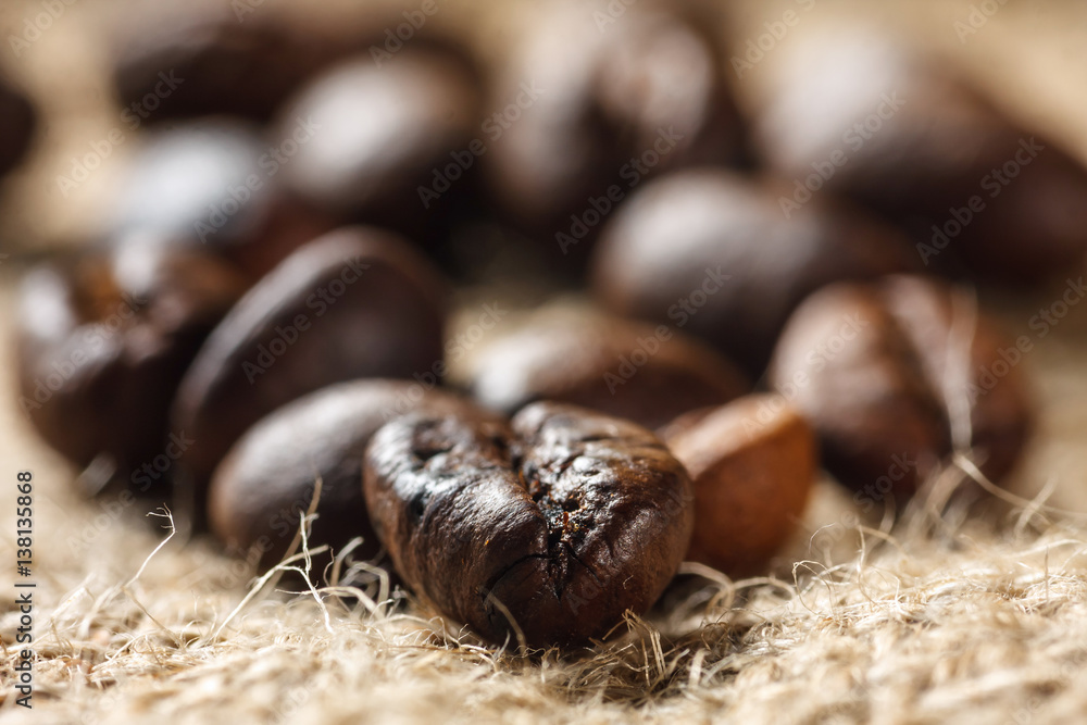 Coffee on grunge burlap background, close up Coffee on grunge burlap background, close up