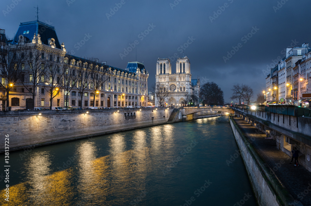 Notre-Dame de Paris and Seine river at blue hour