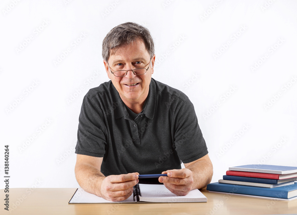 casual business man sitting at a table casual business man sitting at a table