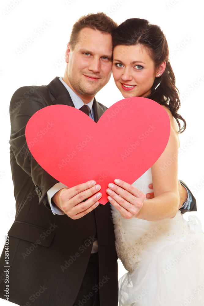 Groom and bride couple holding heart Groom and bride couple holding heart