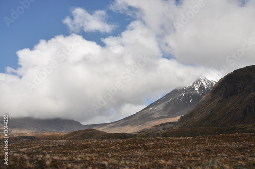 Valokuvatapetti Mount Doom in clouds at Mordor (Mount Ngaunuhoe) Walkway at Tongariro Alpine Cro