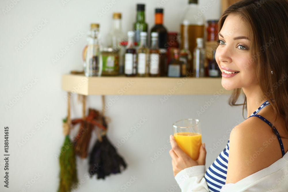 Portrait of a pretty woman holding glass with tasty juice Portrait of a pretty woman holding glass with tasty juice