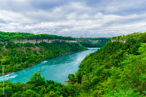 Beautiful amazing gorgeous view of Niagara Falls river with torrent of water abruptly changes direction and creates one of the worlds most mesmerizing natural phenomena, the Niagara Whirlpool 