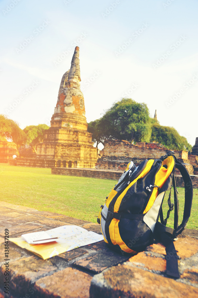 custom made wallpaper toronto digitalBackpack with tourist equipment - isolated on Ayutthaya temple Thailand