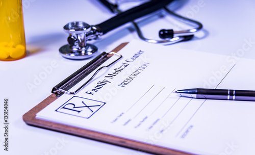 Wallpaper Mural family doctor in the hospital making prescriptions for his patients Torontodigital.ca