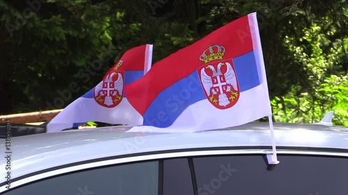 serbian flags on car slow motion