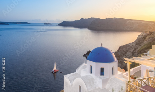 Sunset over local church in Oia  Santorini  Greece