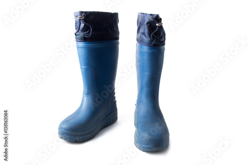 Pair of blue rubber EVA boots isolated on white photo