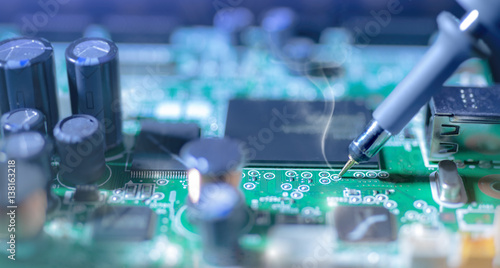 Obraz na plátně Electronic background: soldering of computer motherboard