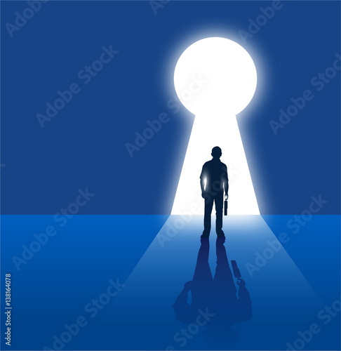  freedom concept,businessman standing  in front of keyhole with light