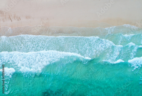 Aerial view. Top view.amazing nature background.The color of the water and beautifully bright.Azure beach with rocky mountains and clear water of Thailand ocean at sunny day.