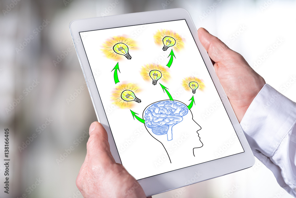 Human brain ideas concept on a tablet Human brain ideas concept on a tablet