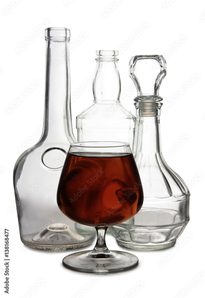 Glass with brandy and cognac on white background Glass with brandy and cognac on white background