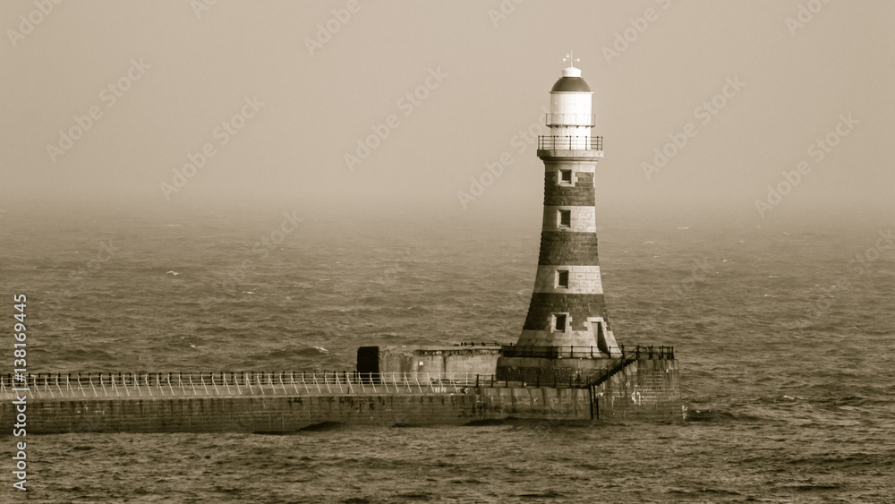 Roker Lighthouse in Sunderland England in Sepia