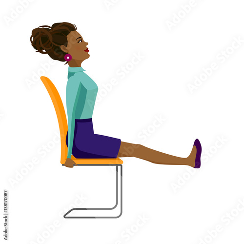 Pretty African American woman in business clothes is doing exercises for back on the office chair. Business woman in healthy strengthening legs pose.