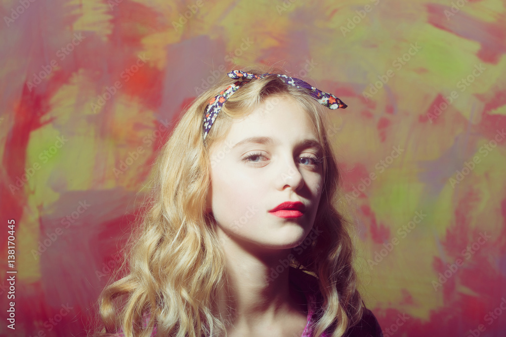 Pretty girl with red lips and blond curly hair Pretty girl with red lips and blond curly hair