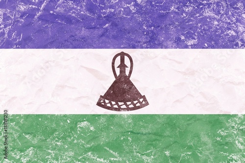 Vintage Lesotho flag texture on crumpled sack paper