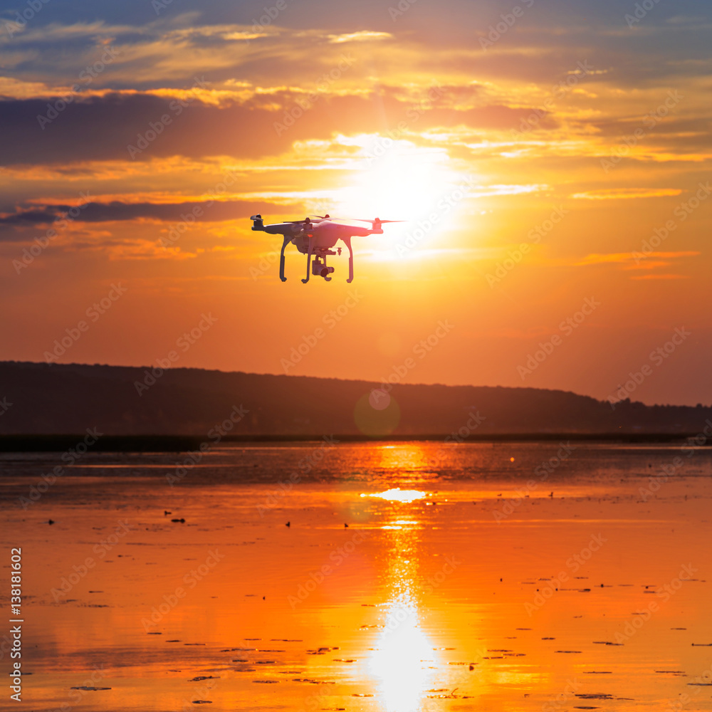 drone at sunset. professional photo and 4k video processing. new innovations technology concept drone at sunset. professional photo and 4k video processing. new innovations technology concept