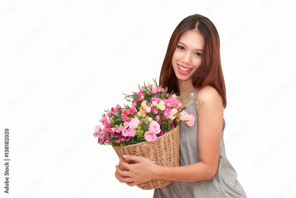 Girl holding a basket of flowers.