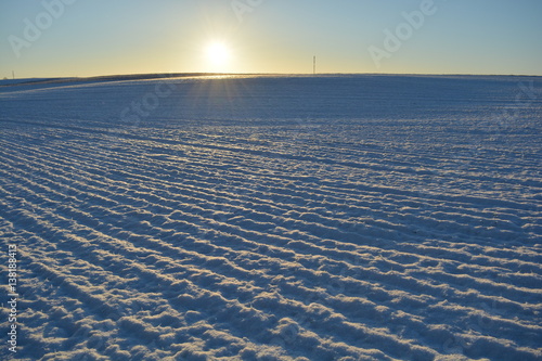 winter time agriculture farm field and morning sunlight