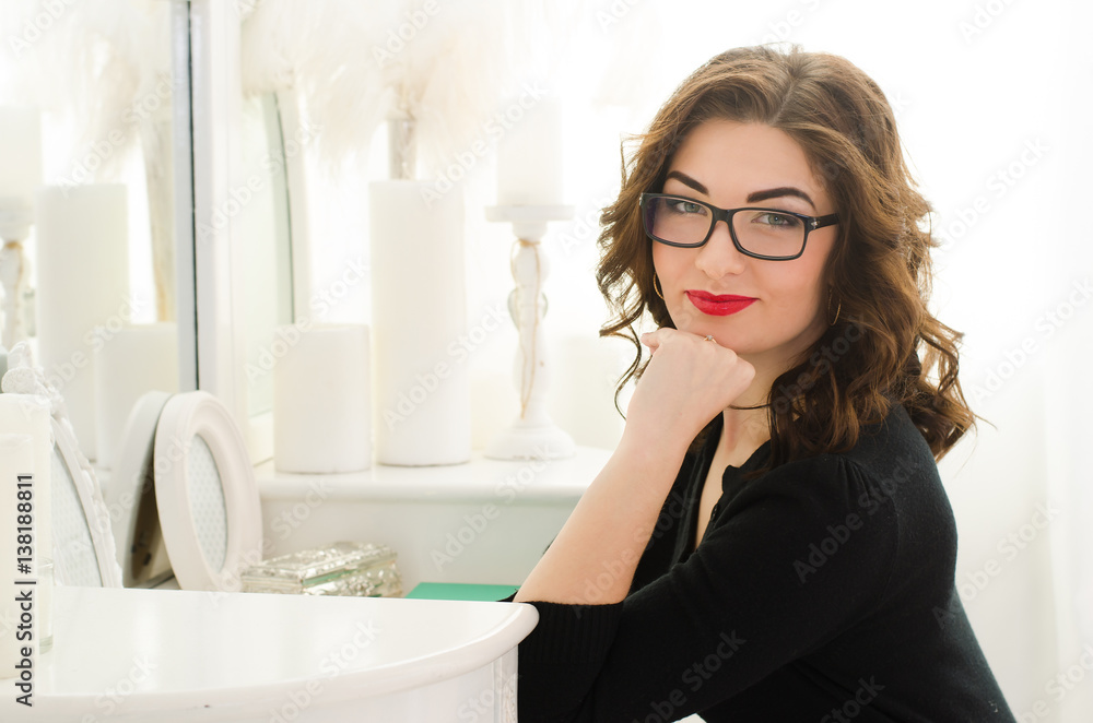 Portrait of attractive businesswoman at a table for make up Portrait of attractive businesswoman at a table for make up
