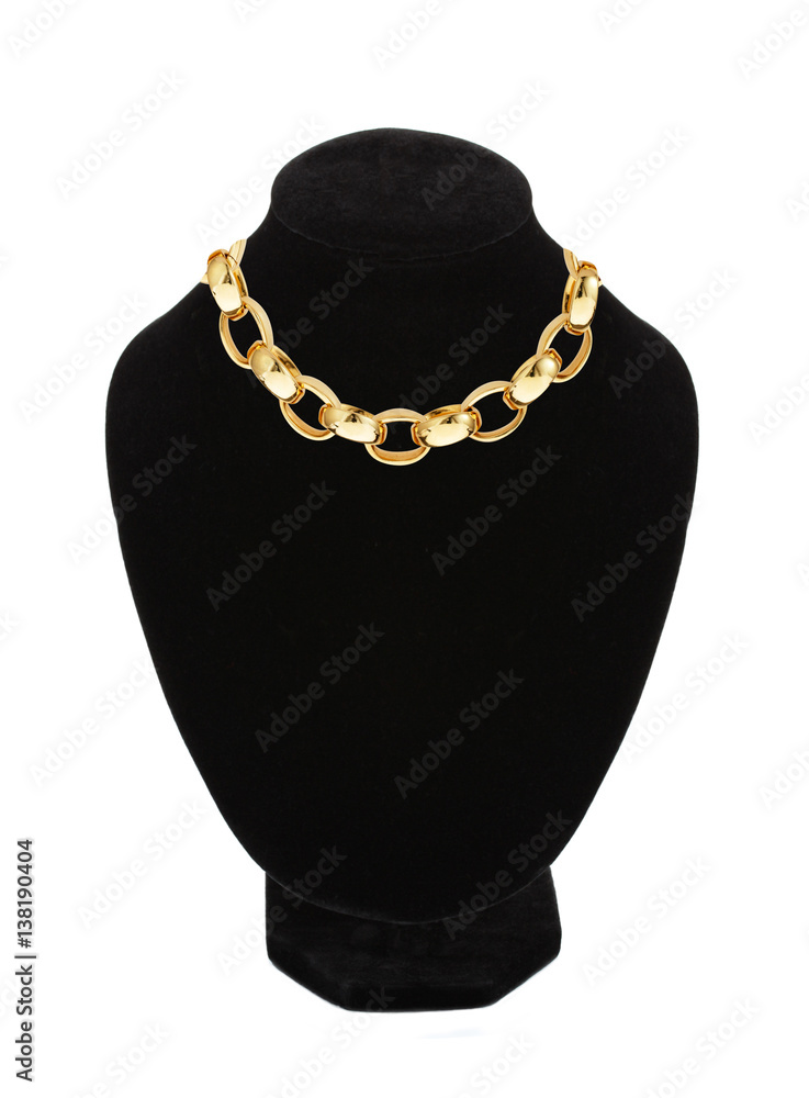 beautiful golden necklace on mannequin isolated on white beautiful golden necklace on mannequin isolated on white