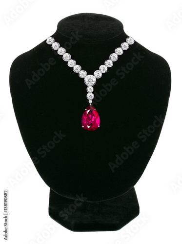 Diamond and ruby necklace on black mannequin isolated on white