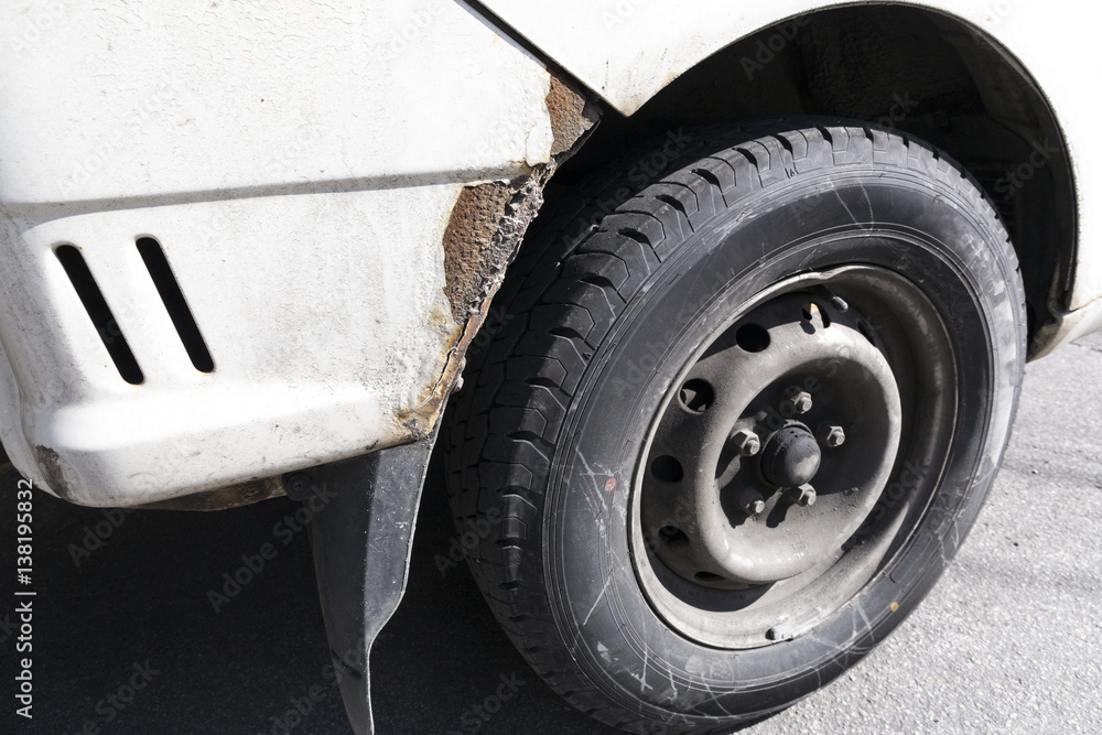 crashed car front side and bumper tire. crashed car front side and bumper tire.